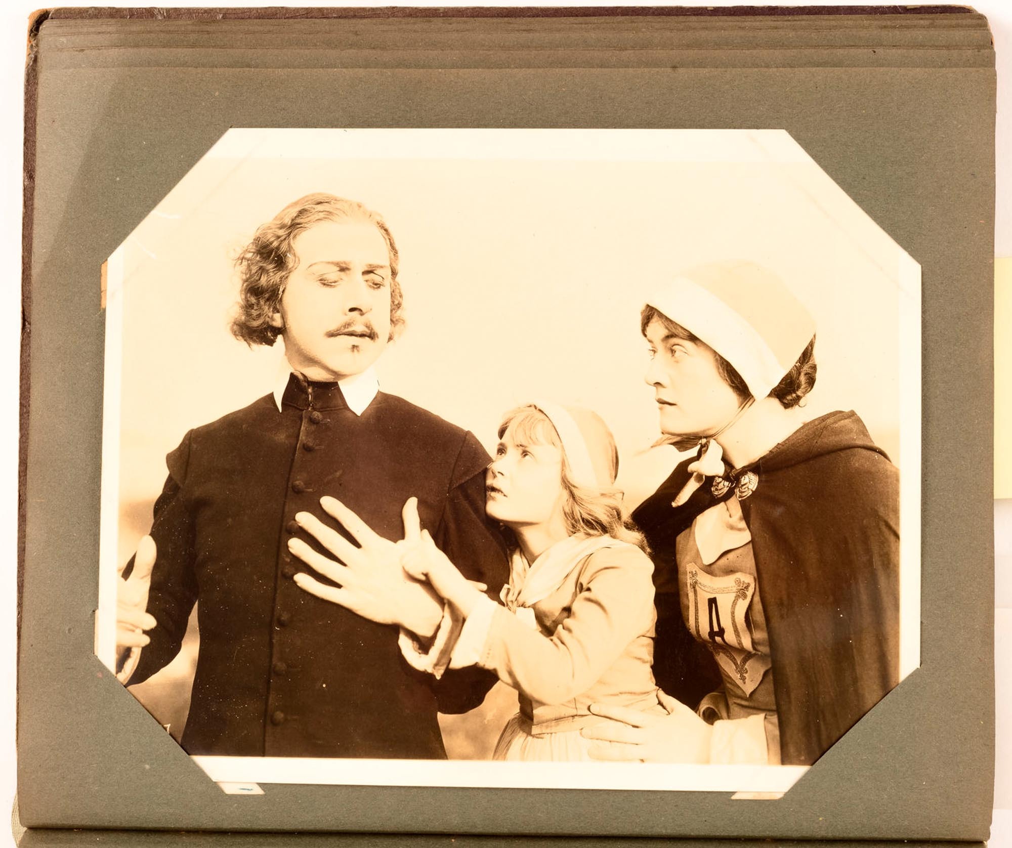 An album of publicity photographs for silent movies from the late 1910s ...